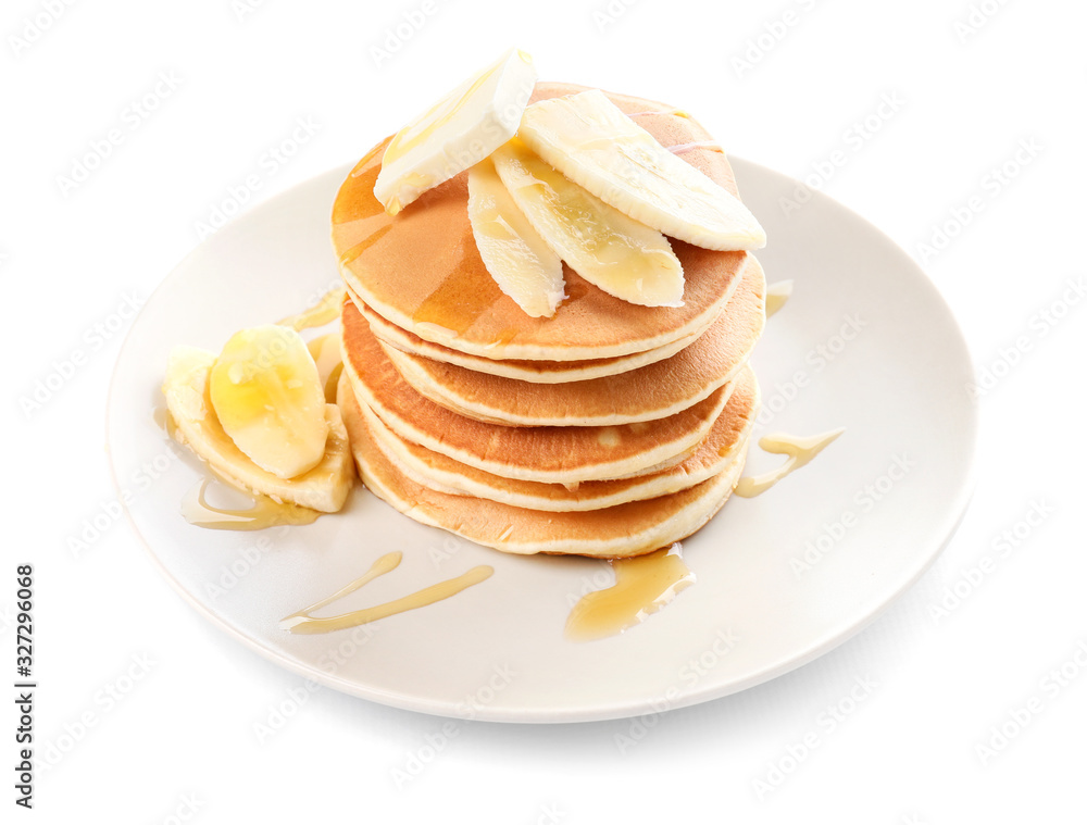 Tasty pancakes with honey, butter and banana on white background Tasty pancakes with honey, butter and banana on white background