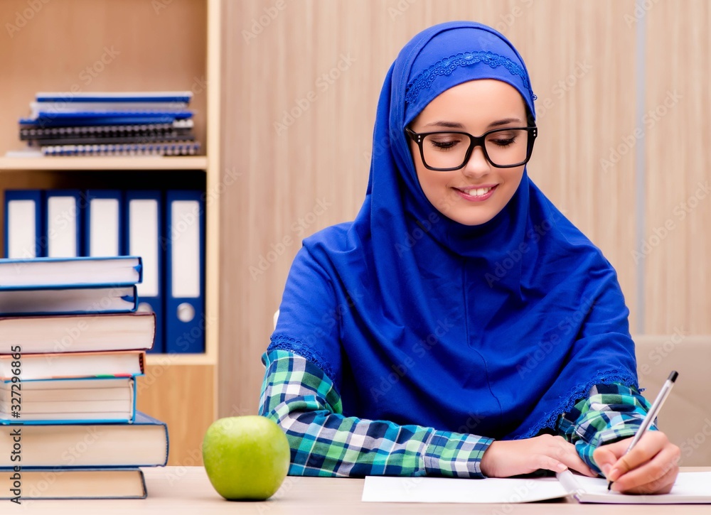 Muslim girl preparing for entry exams