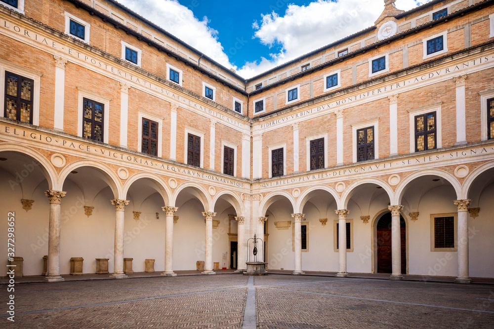 URBINO - ITALY – : Courtyard of Palazzo Ducale (Ducal Palace), now a museum, in Urbino. Marche region, Italy.
