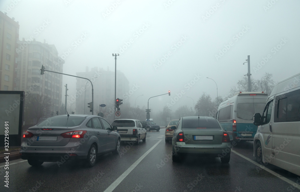 Heavy traffic at fog weather