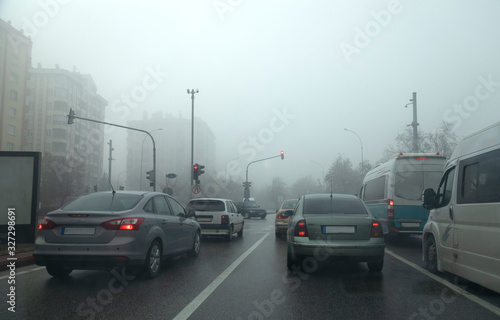 Heavy traffic at fog weather