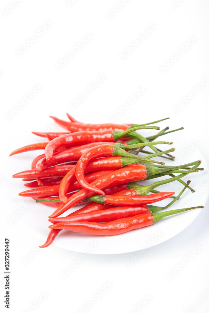 A pile of fresh red peppers
