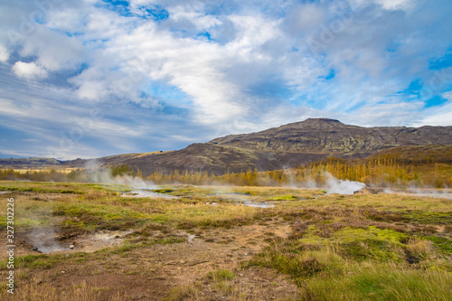 Geysir Golden Circle in Iceland steaming landscape many hot springs