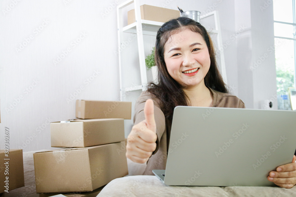 Young entrepreneurs do business online, deliver products by mail. Modern business concepts, startup, SME Young entrepreneurs do business online, deliver products by mail. Modern business concepts, startup, SME
