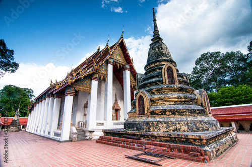 Old temple and Pagota of Wat in Ratchaburi Thailand photo