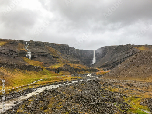 Litlanesfoss and Hengifoss waterfall in east Iceland during heavy rainfall