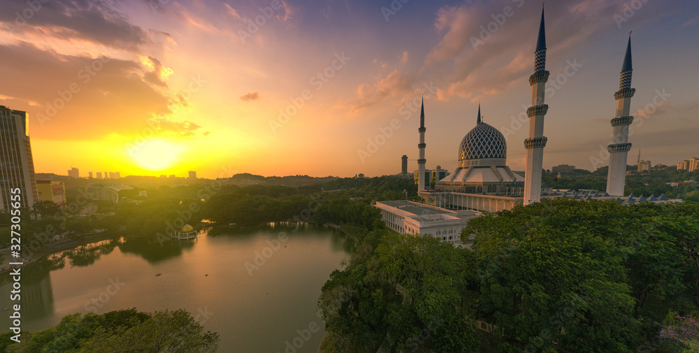 super panorama sunset view aerial shot with mosque and lake in the frame