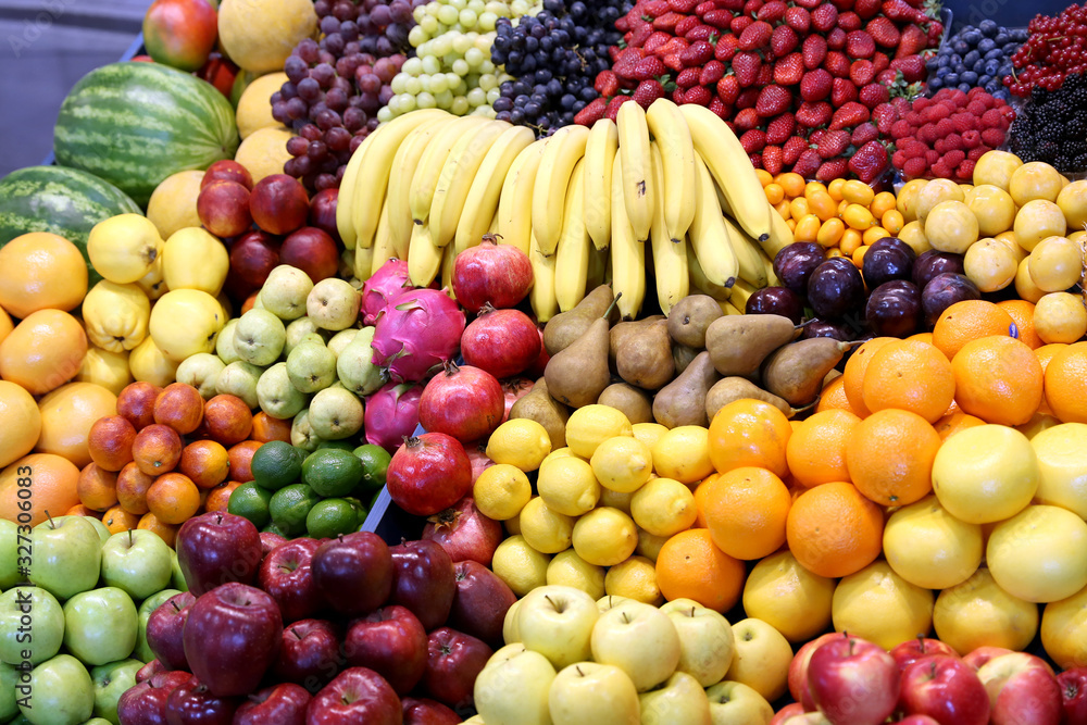 Various fresh summer exotic fruits for sale on market Various fresh summer exotic fruits for sale on market