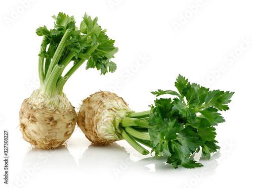 Fresh celeriac with leaves isolated