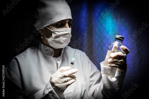 Scientist putting a sample in a test tube in a chemical laboratory