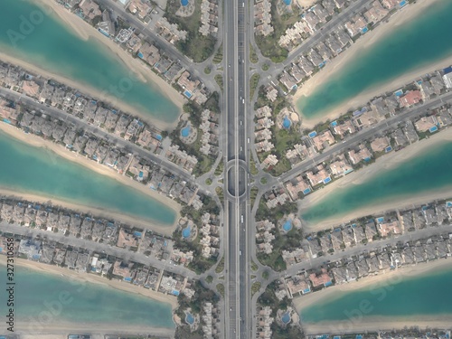 Aerial top down panoramic shot of the famous Palm Jumeirah artificial archipelago in Dubai, UAE