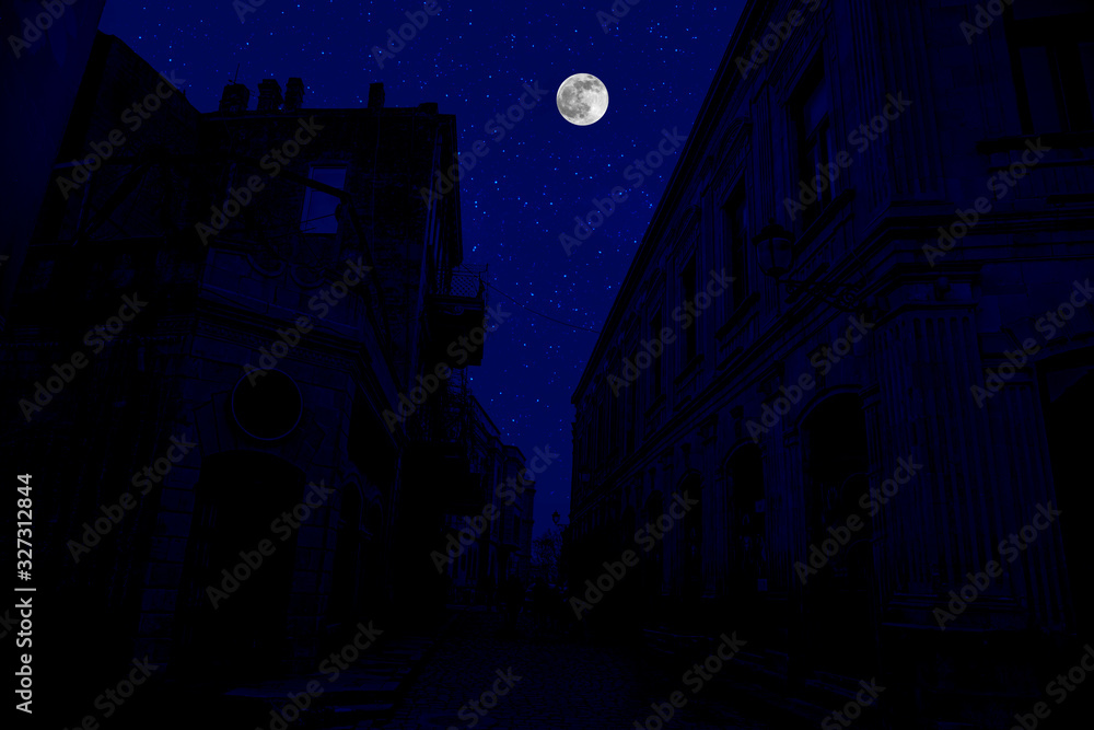 Full moon over the city at night, Baku Azerbaijan. Big full moon shining
