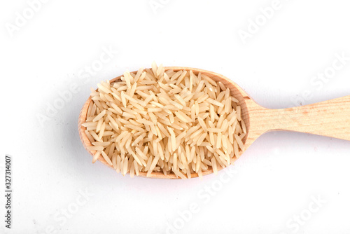 rice in a spoon. rice close up