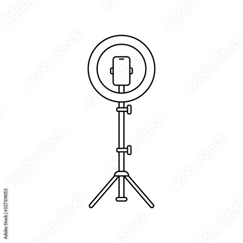 Led ring lamp on tripod with smartphone. Linear icon. Black simple illustration of light for selfie, blogger. Contour isolated vector image on white background