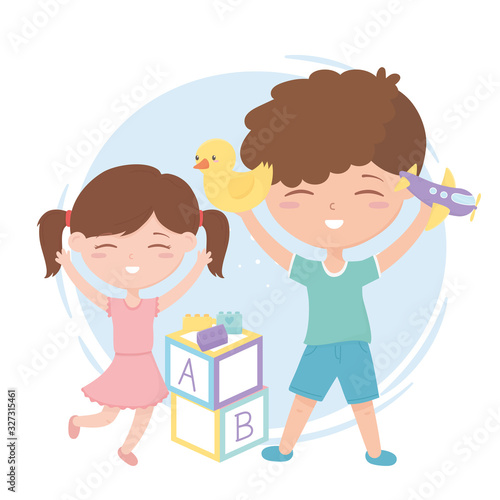 kids zone, cute little boy and girl with duck plane and blocks toys