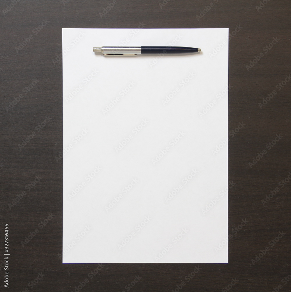 Template of white paper with pen on dark wenge color wooden background. Template of white paper with pen on dark wenge color wooden background.