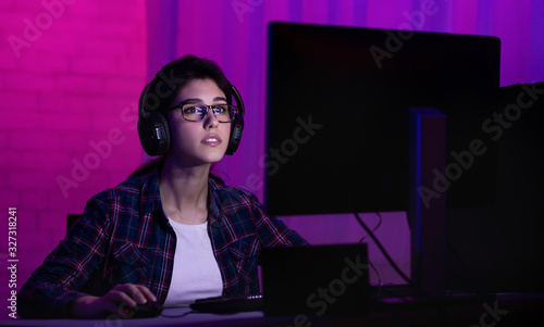 Photography Girl At Desktop Computer Playing Online Shooter Games At Night