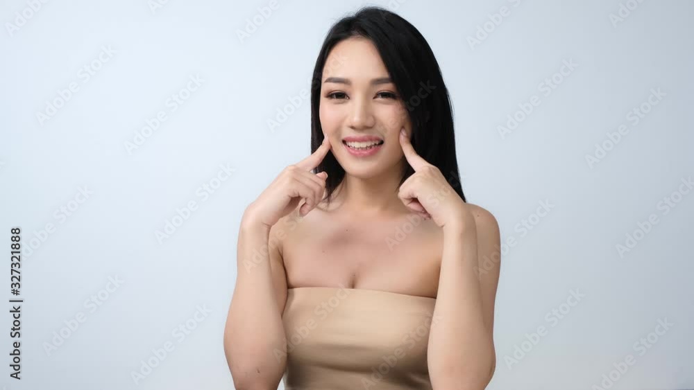 Portrait of beautiful woman with happy emotion at white background. People with beauty, healthy, fashion concept.Attractive Asian woman tossing her long.4k resolution. Portrait of beautiful woman with happy emotion at white background. People with beauty, healthy, fashion concept.Attractive Asian woman tossing her long.4k resolution.