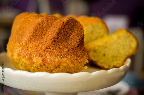 homemade gugelhupf cake cuttet in pieces served on plate