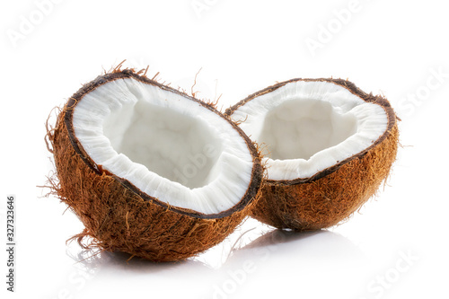 Coconut Opened. Halved ripe coconut closeup