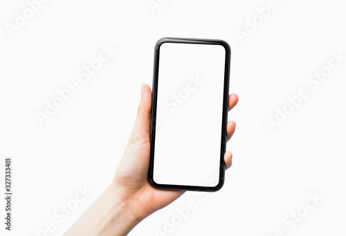 Close-up of hand holding black smartphone isolated on white background.