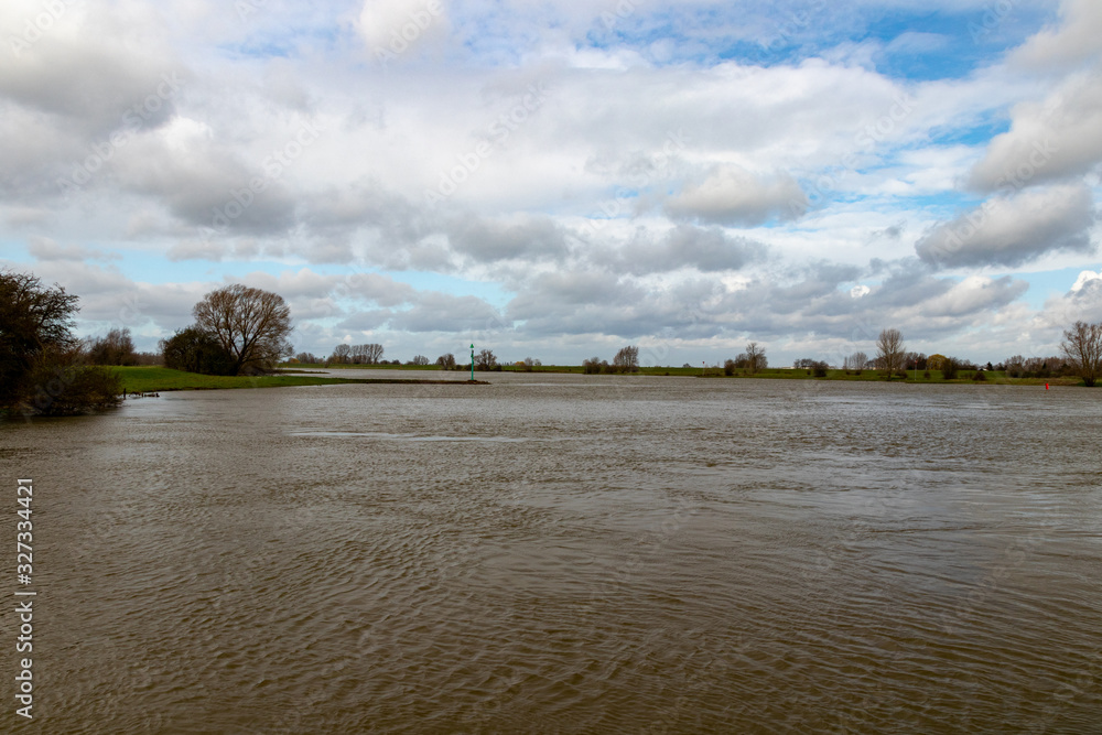 High water of Lek river in The Netherlands during winter
