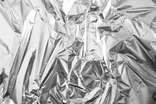 aluminium foil crumpled Silver texture abstract background photo