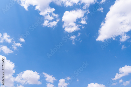 The blue sky with moving white clouds. The most of clouds are beautiful color and shade  suitable for use as background image.