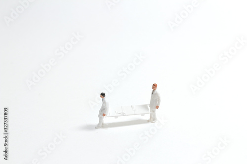 a Male nurse miniature figure concept health emergen. photo