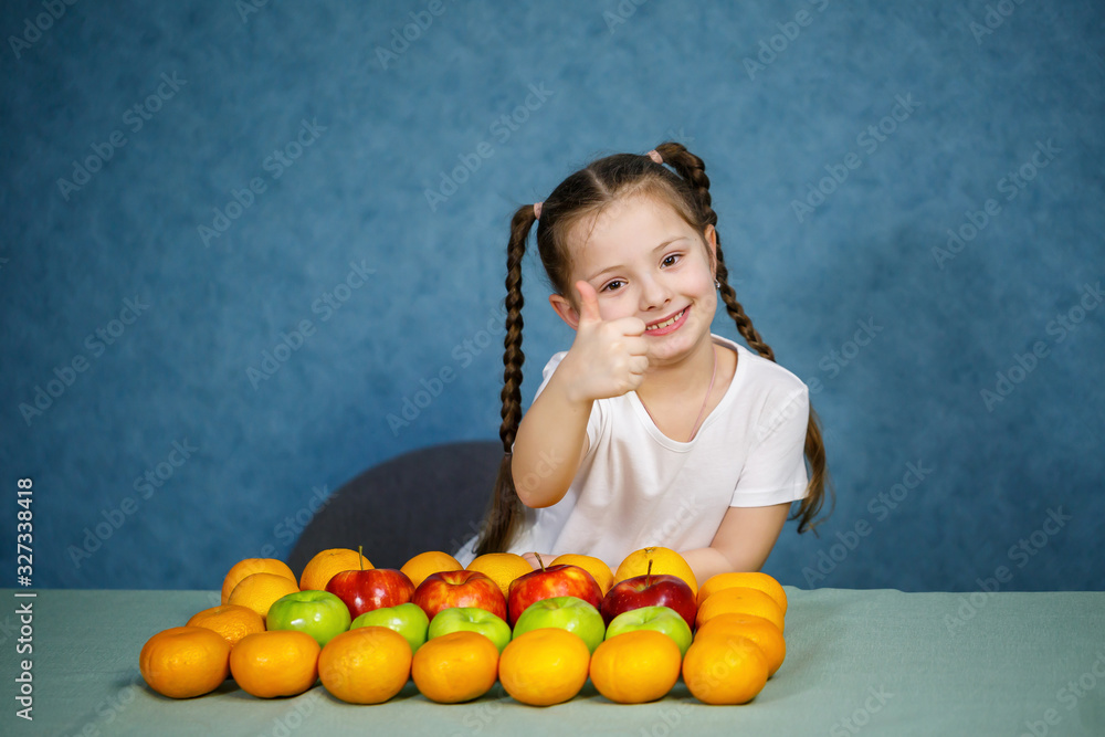 Little girl in white T-shirt love fruit Little girl in white T-shirt love fruit