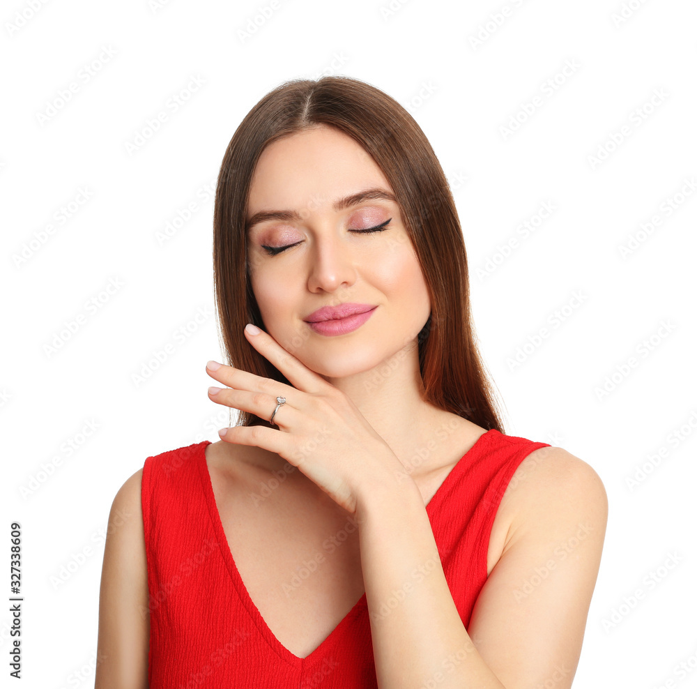 Happy young woman wearing beautiful engagement ring on white background Happy young woman wearing beautiful engagement ring on white background