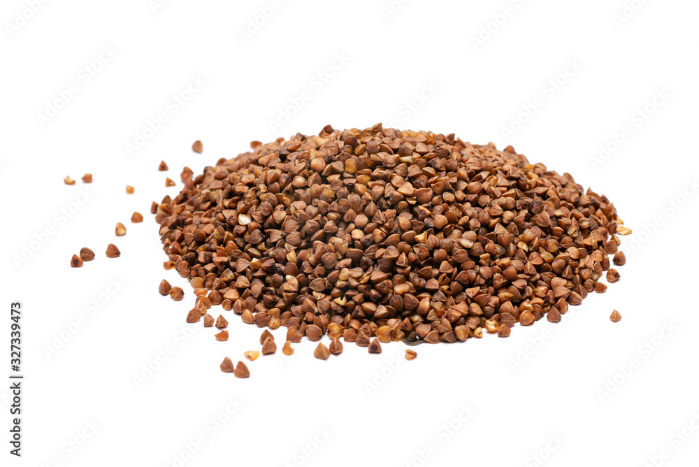 raw buckwheat groats on a white background raw buckwheat groats on a white background