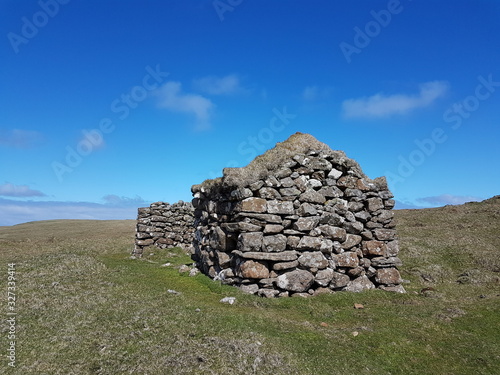 Grassroof house ocean stone wall faroe islands mykines