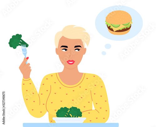 A young girl is holding a fork with broccoli in her hand and she is dreaming of a burger. Healthy vs unhealthy food concept.