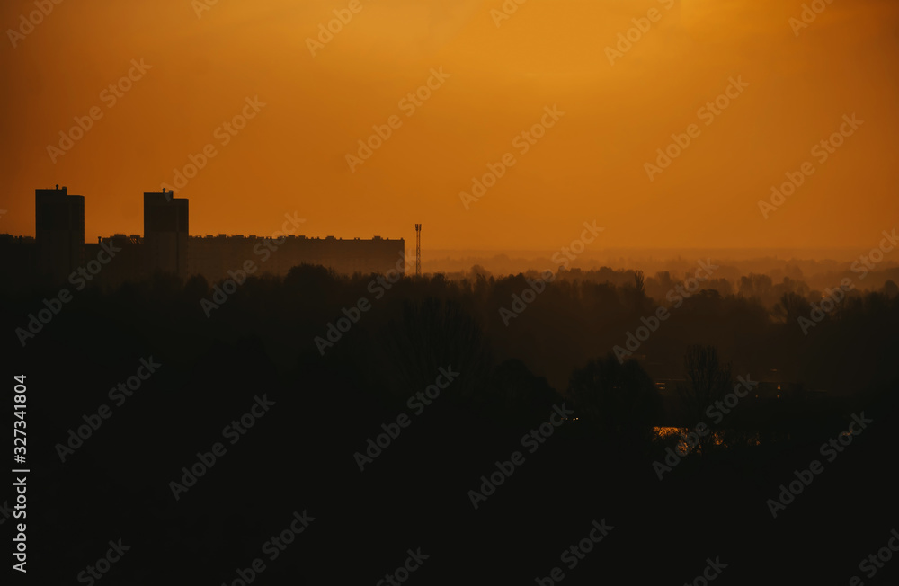 Beautiful sunset in the city skyline during cold winter evening. Beautiful sunset in the city skyline during cold winter evening.