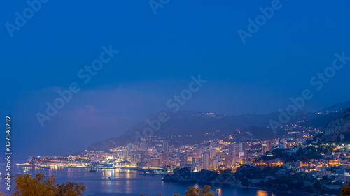 Cityscape of Monte Carlo night to day timelapse, Monaco before summer sunrise.