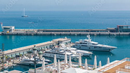 Mediterranean sea, boats and Monaco yacht club timelapse in Monte Carlo district, Monaco photo