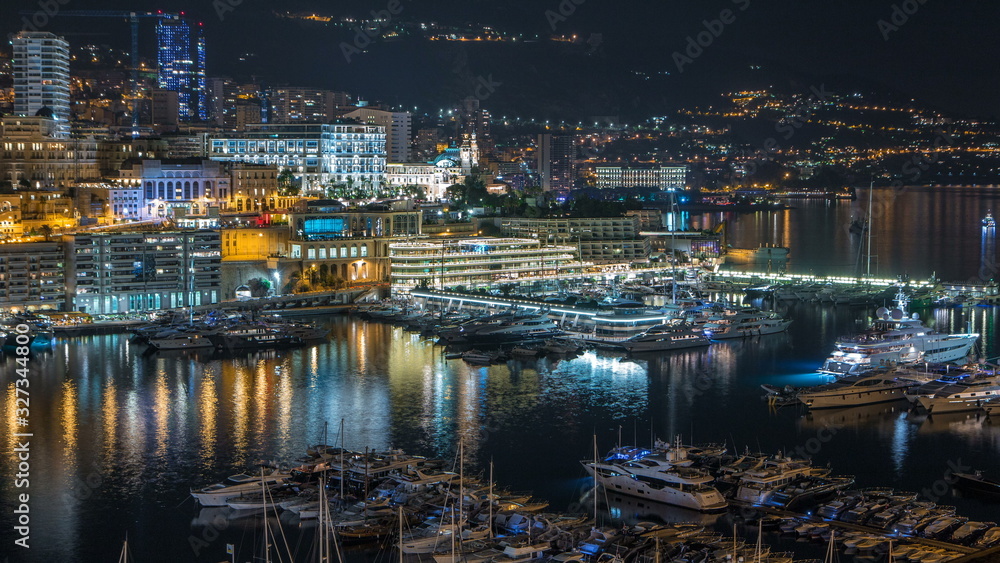 Panorama of Monte Carlo timelapse at night from the observation deck in the village of Monaco with Port Hercules.