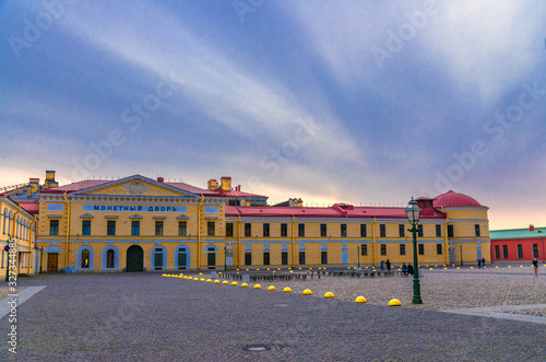 Saint Petersburg Mint in Peter and Paul Fortress citadel on Zayachy Hare Island, evening dusk twilight view, Leningrad city, Russia
