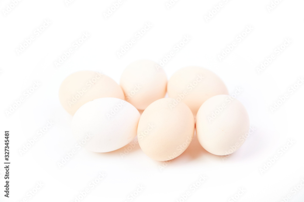 A pile of fresh raw eggs A pile of fresh raw eggs