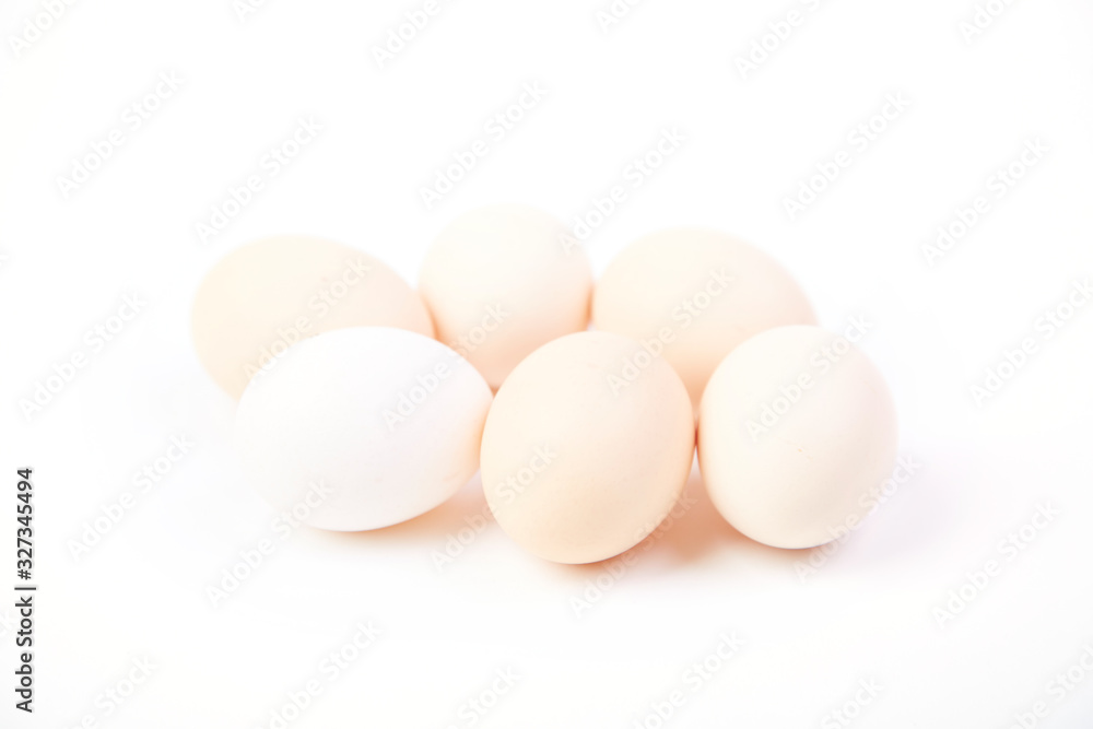 A pile of fresh raw eggs
