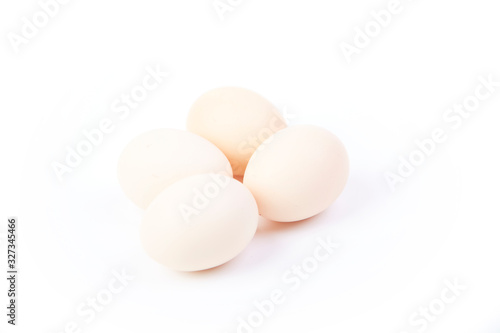 A pile of fresh raw eggs
