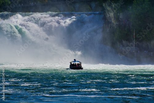Bild auf Leinwand the famous rhine falls in the swiss near the city of Schaffhausen - sunny day an