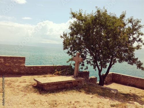 Perfect grave on a hill with sea view