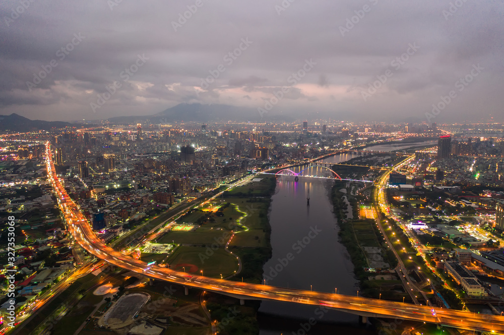 Crescent Bridge - landmark of New Taipei, Taiwan with beautiful illumination at night, photography in New Taipei, Taiwan.