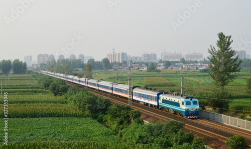 Photography Xuchang,China-08/24/2015:SS8 pulled Zhengzhou Guangzhou T255 times through Xucha