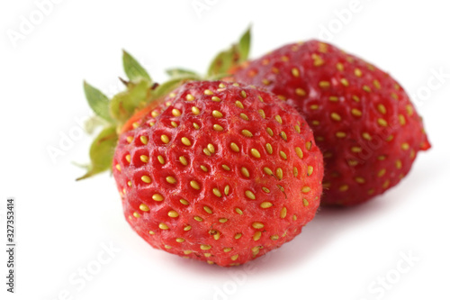 Two strawberries isolated on white