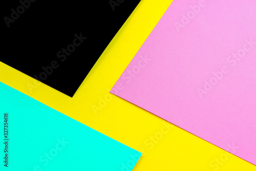 Free Download sheets of yellow, pink, and black paper on a blue background - GFXLoad