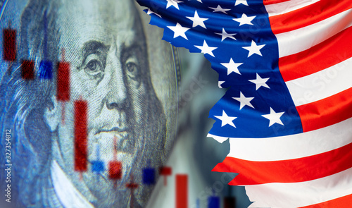 Economy of the United States. Franklin next to the flag of the US. AFragment of a dollar bill. Concept - stock market panic. Foreign exchange market of the USA. Red chips mean economic decline photo