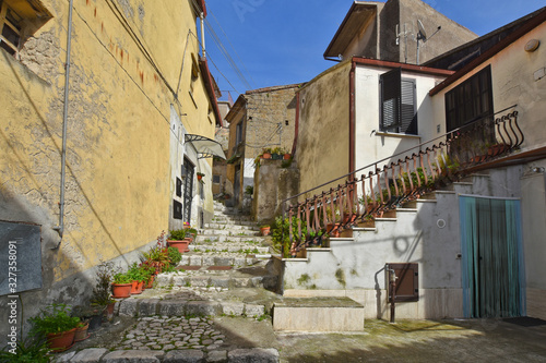 Montesarchio, Italy, 02/29/2020. A narrow street between the old houses of a medieval village. © Giambattista